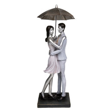 Load image into Gallery viewer, Couple in Loving Embrace with Umbrella